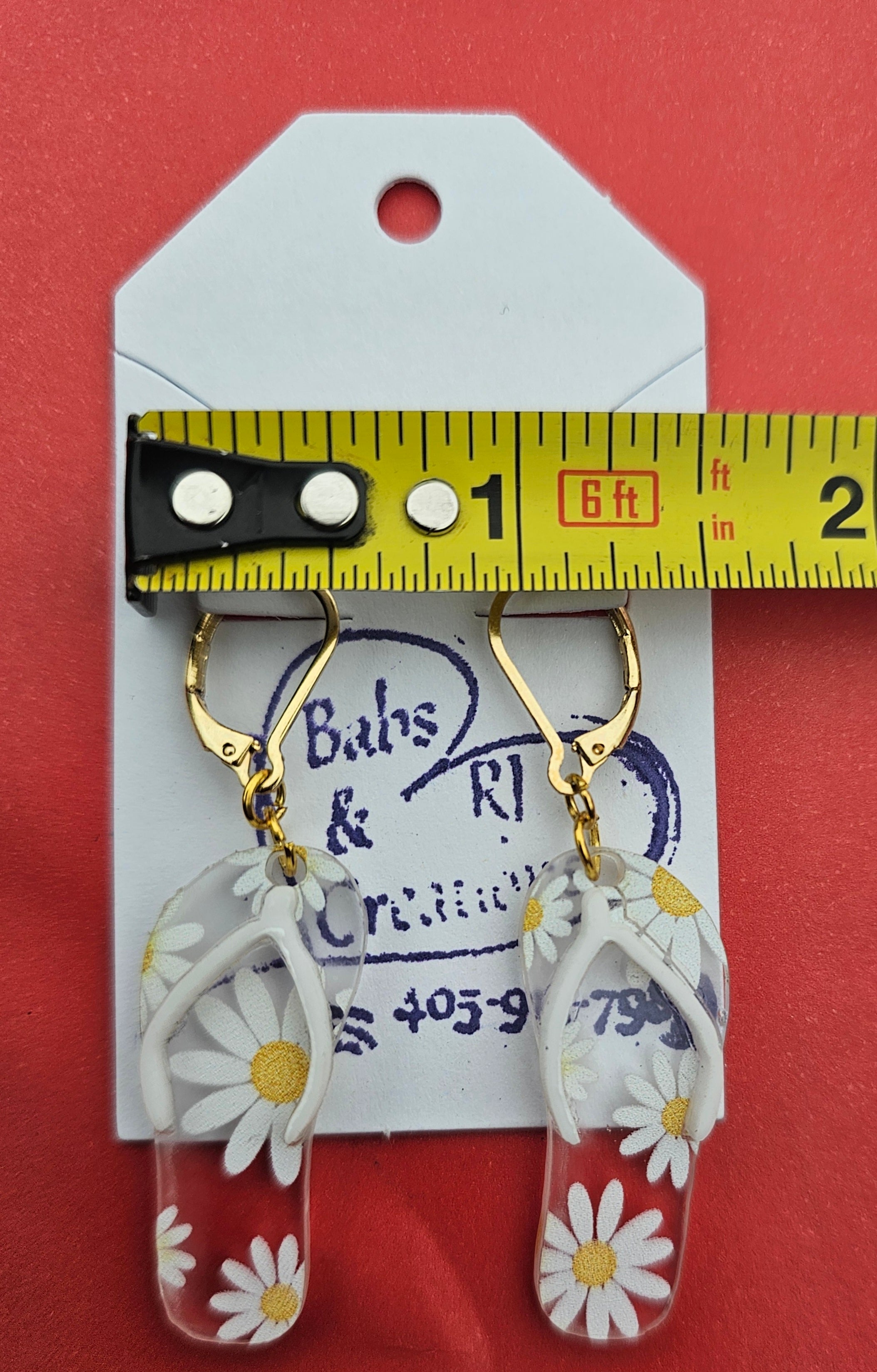 Daisy patterned acrylic flip flop earrings by Babs & RJ Creations